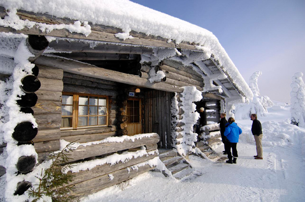 Log cabin in the winter, Iso/Syote, Finland Photo