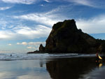 Surfing, Piha, New Zealand photo