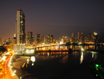 Panama City coastal road at dusk, showing the Intercontinental Miramar Hotel tower at left, Panama photo