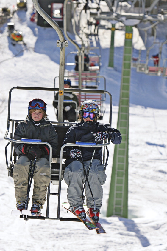 Children on a ski lift, Jamtland, Sweden Photo