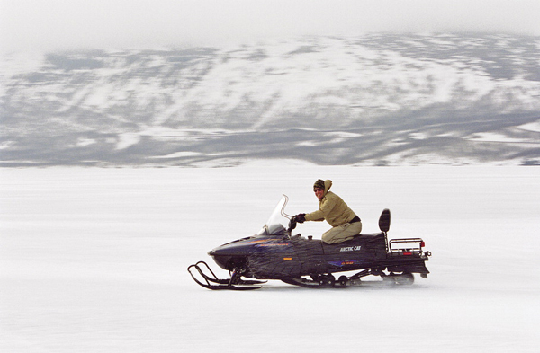 Snowmobile, Tornetrask, Lapland, Sweden Photo