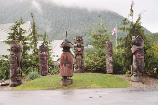 Clan Council totem poles, Cape Fox Hill, Ketchikan, Alaska, United States photo
